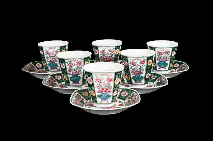 Set of six Chinese porcelain famille rose black ground beakers and saucers